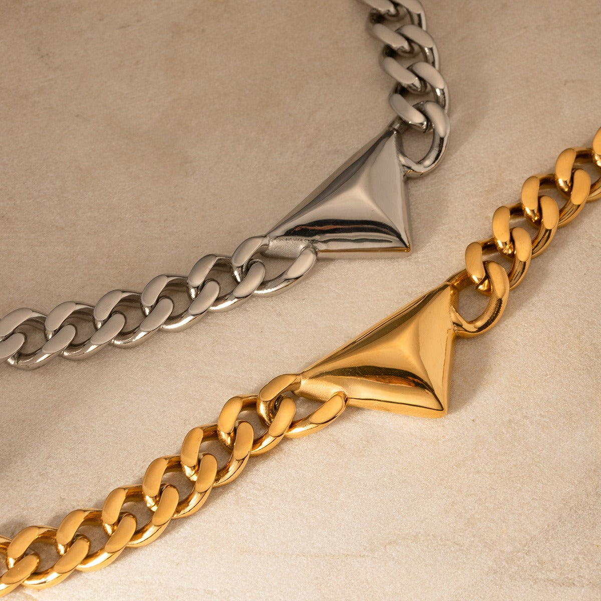 18k gold exaggerated triangle design necklace with Cuban chain