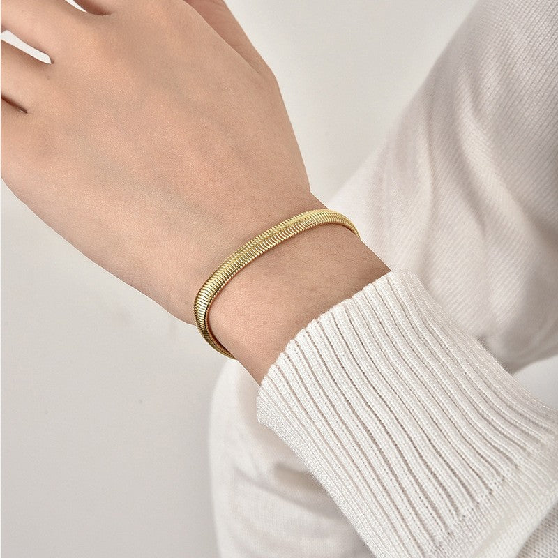 18K gold minimalist fashionable flat snake bone chain design versatile bracelet